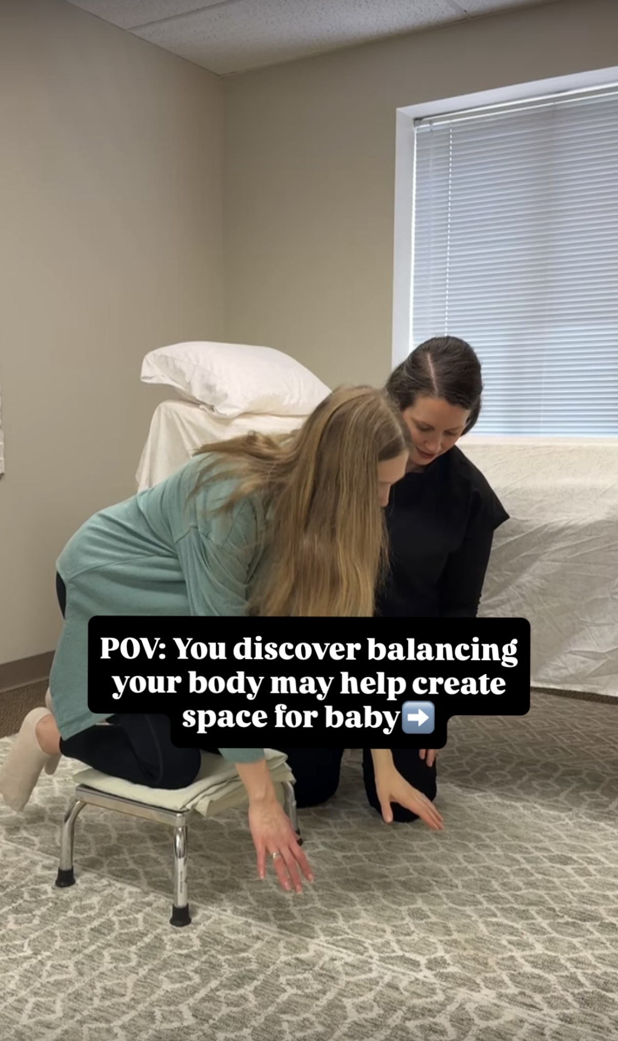 PT is helping mom into a spinning baby inversion pose.